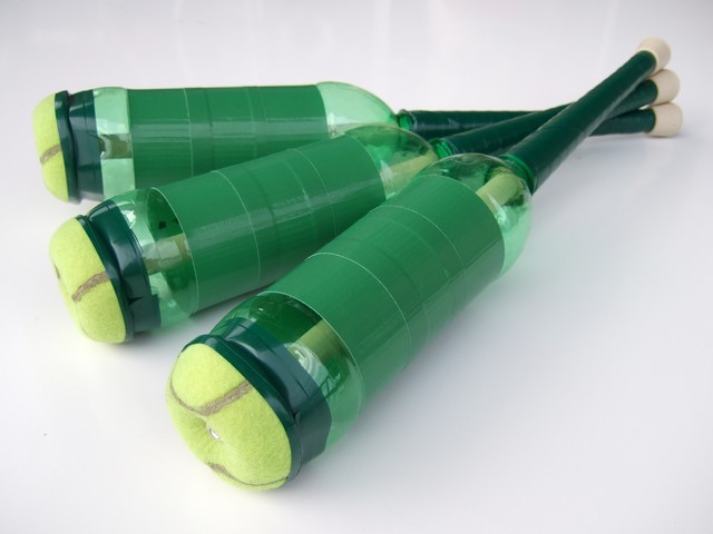 My very first set of three green Green Clubs, made with 24 oz Mountain Dew bottles.
